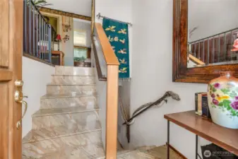 Custom granite stairway upon entry