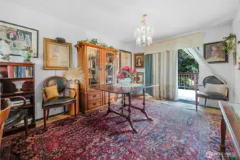 Large dining room with slider to large back deck