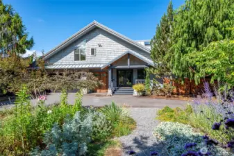 Situated on almost 3/4 of an acre with lush, mature landscaping