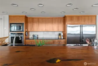 Beautiful cherry cabinets and new appliances.