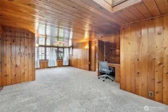 Spacious upstairs bedroom with built-in desk