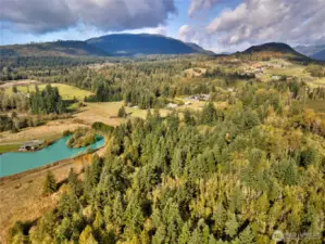 Ariel view of both properties from forested view