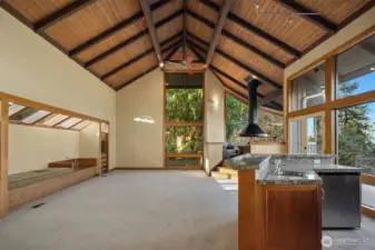 Large living room with 2 story vaulted ceiling