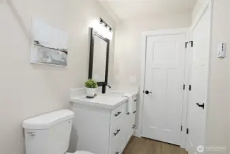 Hallway bathroom with ample space and modern touches