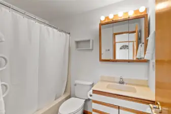 Full bathroom conveniently located adjacent to the bedroom.