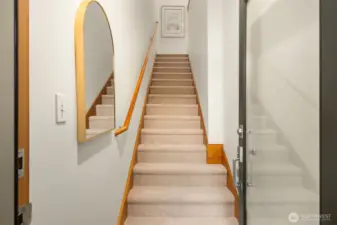 The entry leads up to 1-level living.