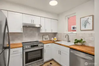 Enjoy cooking and entertaining in this beautifully updated, fully equipped kitchen.