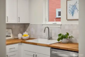 A kitchen sink window adds light and charm.