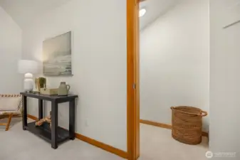 Large closet with versatile storage or office potential.