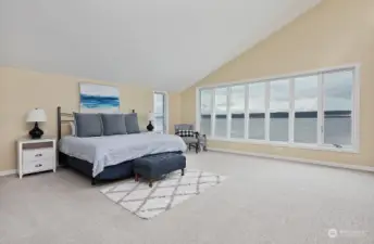 Spacious primary suite with lots of natural light.