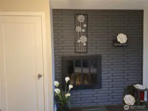 Fireplace in primary bedroom.
