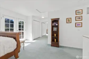 Primary bedroom has lots of closet spaces w/private deck