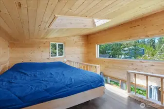 Upper loft of guest cabin has incredible views