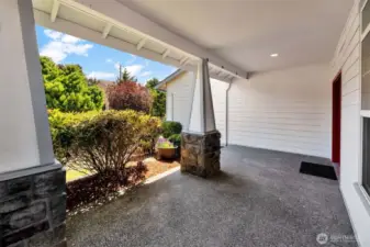 Porch swing, patio chairs and table, holiday decorations or just a clean space to sit and relax out of the sun. Porch faces East.