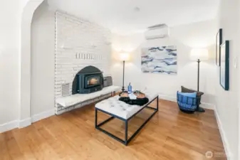 Inviting living room centered around a cozy gas fireplace—perfect for relaxing or entertaining.