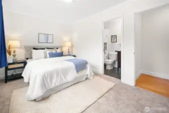 The spacious primary bedroom features an en-suite bath, providing privacy and everyday ease.