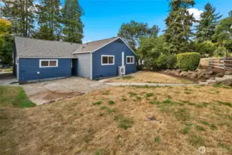 Step outside to a spacious backyard perfect for gatherings, complete with a welcoming patio ideal for summer barbecues, morning coffee, or evening relaxation.