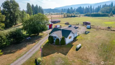 Country Craftsman on acreage with shop & outbuildings