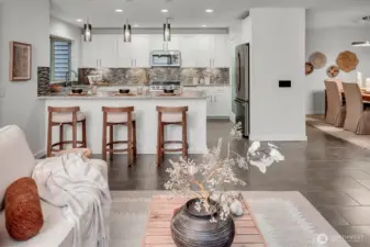 Nicely remodeled is every room w/custom lighting, custom tile flooring, all NEW interior paint, newer SS appliance package too. You are sure to notice + love the abundance of cabinets and storage in the home.    The floorplan is ideal for using rooms, re-imagining them the way you most love and choose to live.