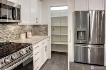 So much to love when a pantry is part of a home! With 2 Costco options w/i 4 miles each of this wonderful home, this is going to be a feature you will love having in a home!