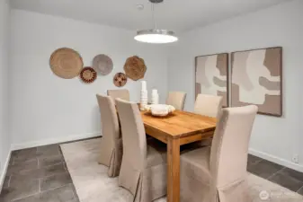 12x12....sized for your favorite and grand sized furnishings. Formal dining....or whatever you love!  No small room feel in this wonderful and perfectly remodeled home in the desirable Microsoft area of Redmond!