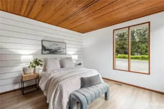 The primary bedroom features new luxury vinyl plank flooring.