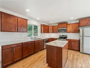 Main Level Kitchen has plenty of cabinets and counterspace for multiple cooks!