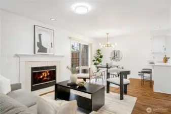 Spacious living room with wood burning fireplace