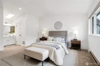 En-suite master bedroom with vaulted ceiling