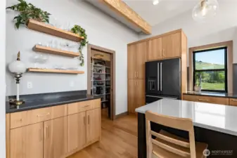 Large walk-in pantry with custom shelving