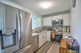 Unit D is fully remodeled, featuring a brand-new kitchen, updated flooring throughout, and modern finishes that set it apart.