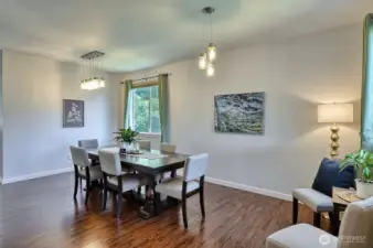 The dining room greets you as you enter. It's light-filled and ready for meals and celebrations big and intimate.