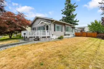 Large lot and partially fenced in yard with a rock garden for you to enjoy.