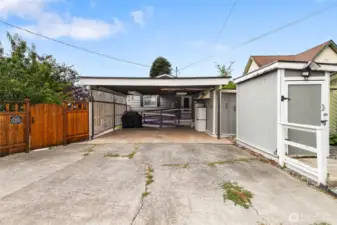 Alley access and your own carport for two cars. As well as 2-sheds for additional storage.