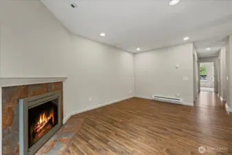Living Room with brand new LVP Flooring and Paint