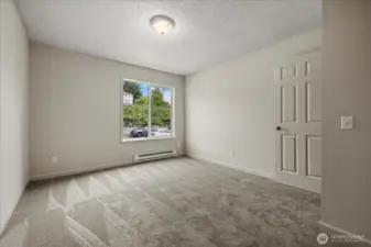 Primary Bedroom with brand new Carpet and Paint