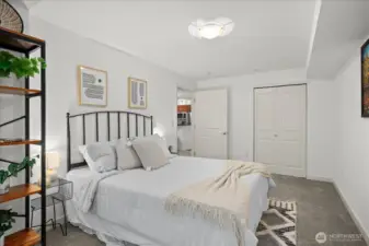 Bedroom overlooking the private courtyard with a walk-in closet.