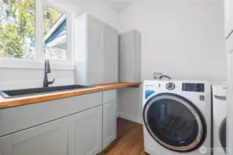 Main Floor Laundry w/Sink & Storage