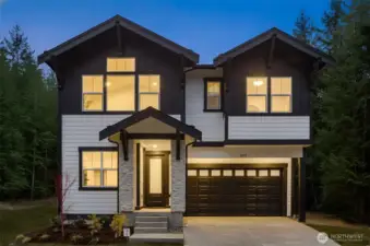 Photo of completed model home on Homesite 11. Color & Selections may vary.