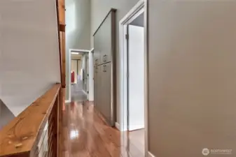 Down the hall from the primary is the laundry center and another guest bedroom and full bath.