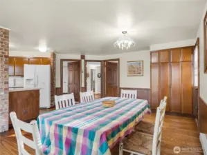 Kitchen with eating space. This room faces the deck which overlooks the dunes and has a full ocean view.