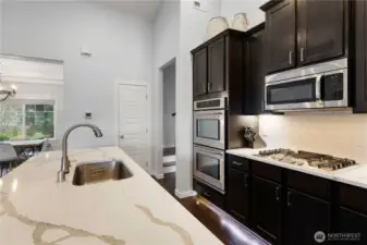 These beautiful countertops were recently installed. Don't miss the double ovens!