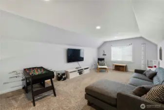 This is your awesome, multi-functional bonus room upstairs!