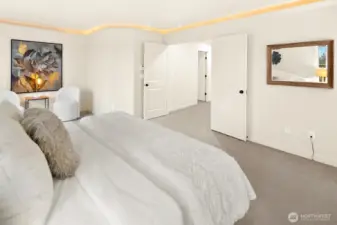 Primary Bedroom with Nook and Ceiling Lighting