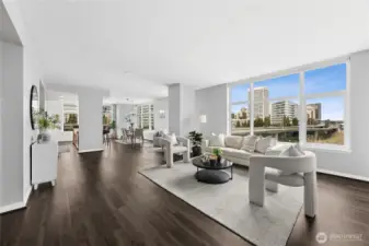 Your living room is anchored by an expansive window that frames gorgeous city views.