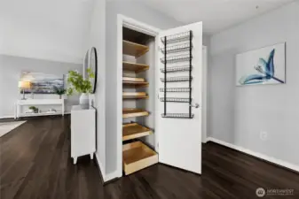 The pantry has sliding drawers which allows easy access to all your groceries.