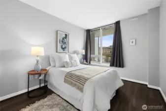 The second bedroom is separated from the primary suite.