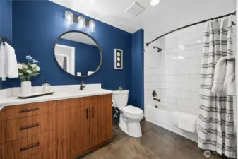 The second bathroom is just across the hall from the bedroom.