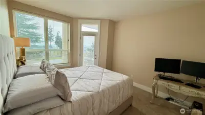 Large Windows and Door To Balcony