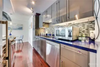 Plenty of counter space for cooking & yes, the microwave stays in the home.